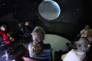  ontario_seniors_nursing_home_activity_planetarium_earth_wheelchair